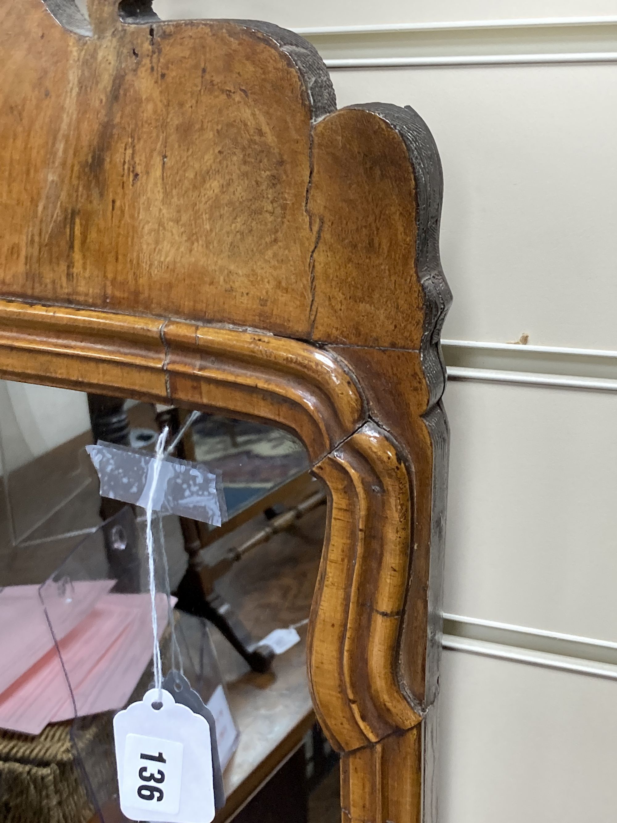 An 18th century walnut fret cut wall mirror, width 56cm, height 86cm